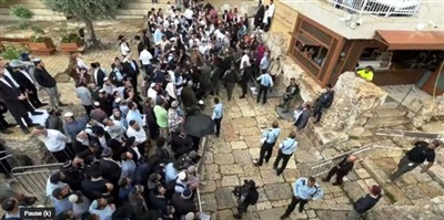 Religious Opposition begins to gather at an entrance to the southern steps of the Temple Mount where intercessors and Israeli Messianic believers are gathered for a prayer event.